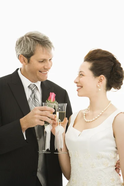 Bride and groom toasting. — Stock Photo, Image