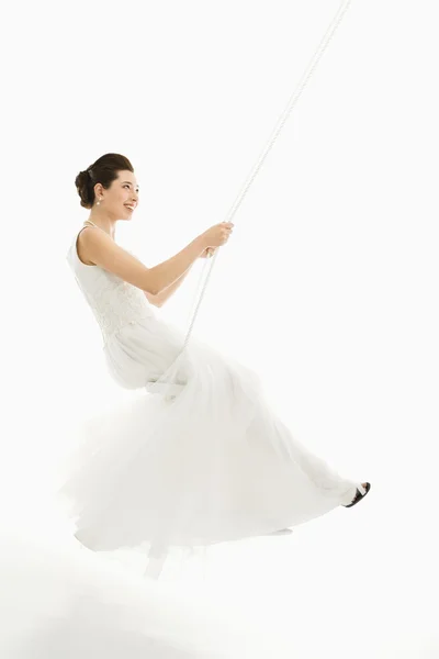 Bride swinging. — Stock Photo, Image