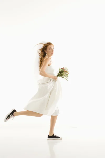 Running bride. — Stock Photo, Image