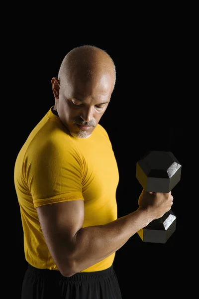 Man exercising with dumbbell. — Stock Photo, Image