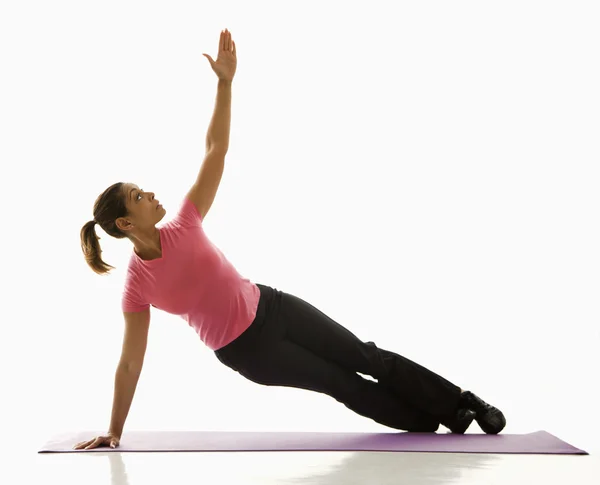 Woman practicing yoga. — Stock Photo, Image