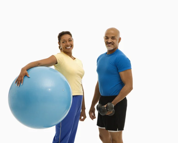 Man and woman exercising. — Stock Photo, Image