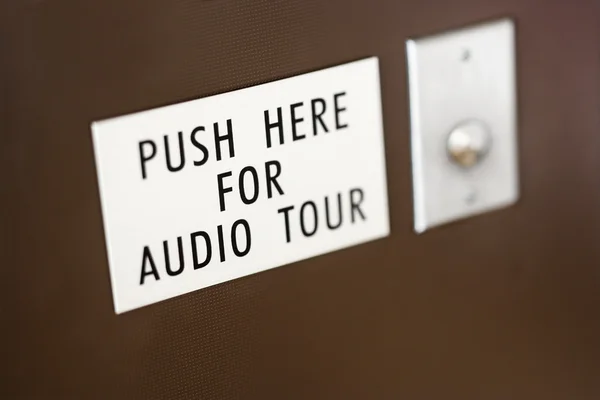 Knop voor audio tour. — Stockfoto