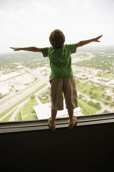 Boy at window. — Stok fotoğraf
