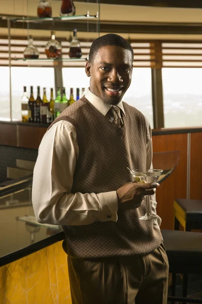 Man drinking martini. — Stock Photo, Image