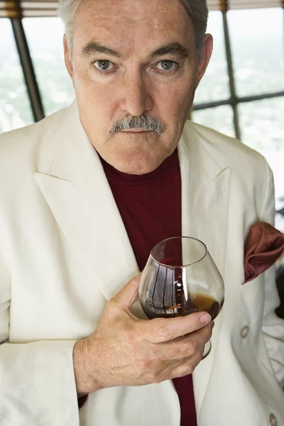 Man holding drink. — Stock Photo, Image