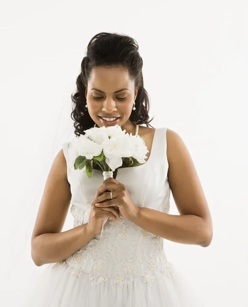 Bride holding bouquet. Stock Picture