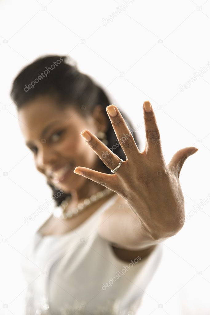 Bride showing ring.