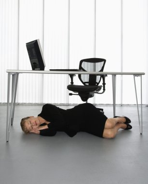 Businesswoman napping. clipart