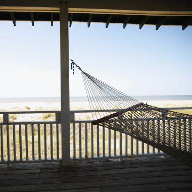 Hammock on porch. clipart