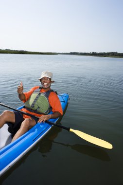 Man in kayak. clipart