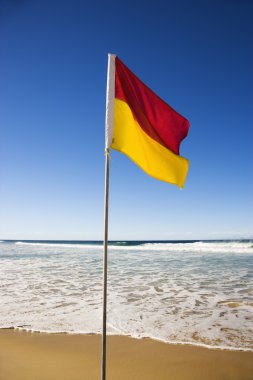 Flag on beach. clipart