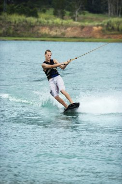 Teen wakeboarder. clipart