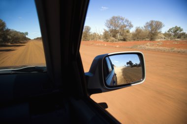 Vehicle on dirt road clipart