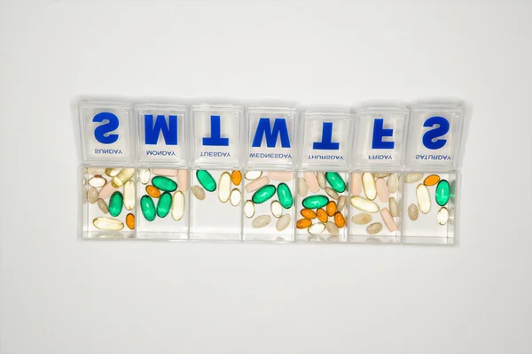 Container with pills. — Stock Photo, Image