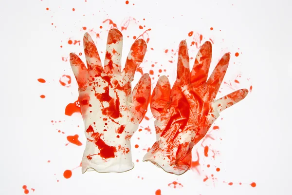 Krev vztahuje gumové rukavice. — Stock fotografie