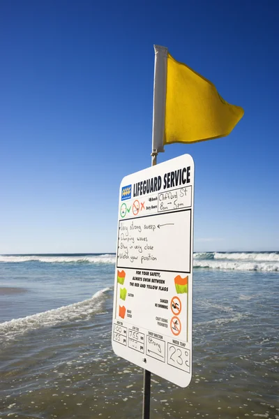 Sign on beach. — Stock Photo, Image