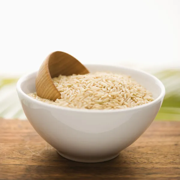 Grain in a White Ceramic Bowl. Isolated — Stock Photo, Image
