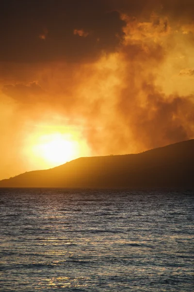 Pôr do sol havaiano. Imagens Royalty-Free