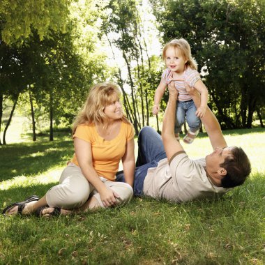 Family in park. clipart