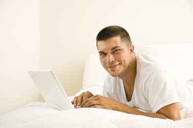 Man on laptop. clipart