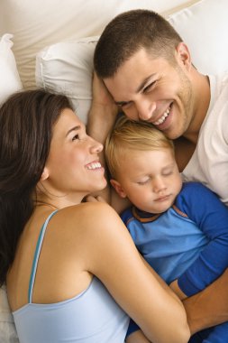 Family cuddling. clipart