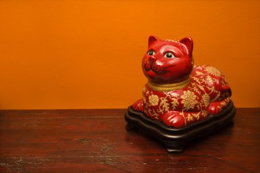 Chinese cat statue. clipart