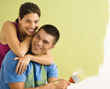 Attractive couple painting. clipart