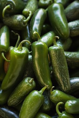 Fresh jalapeno peppers. clipart