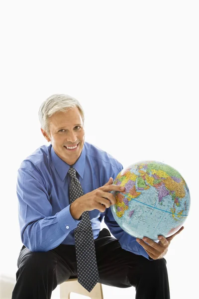 Businessman with globe. — Stock Photo, Image