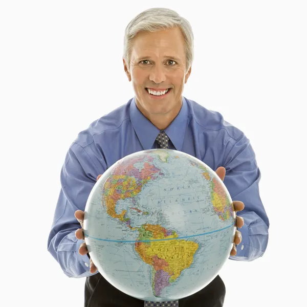 Man gesturing with globe. — Stock Photo, Image