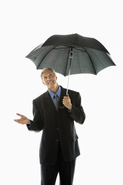 Man holding umbrella. — Stock Photo, Image