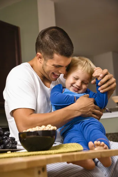 Dad tickling son. — Zdjęcie stockowe