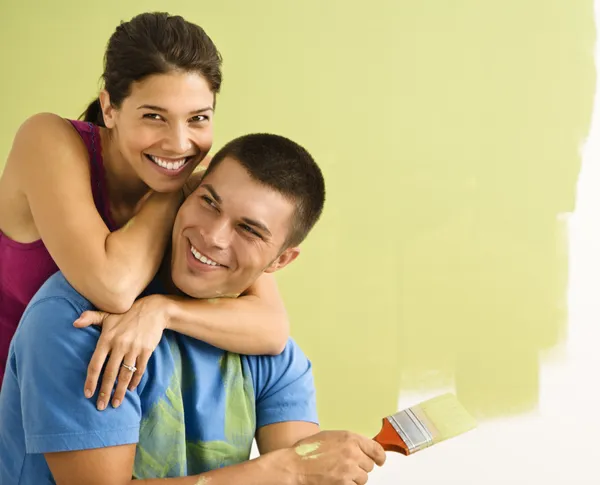 Attractive couple painting. — Stock Photo, Image