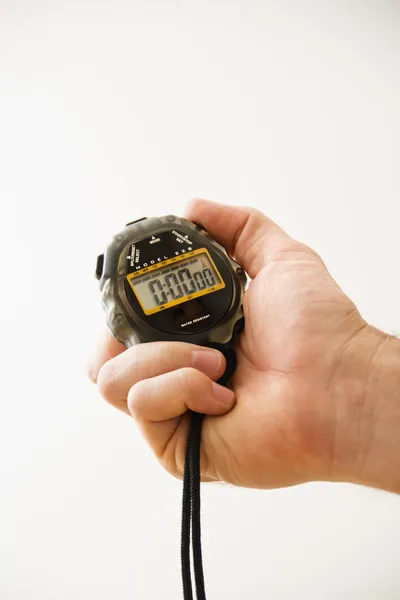 Mão segurando cronômetro . — Fotografia de Stock