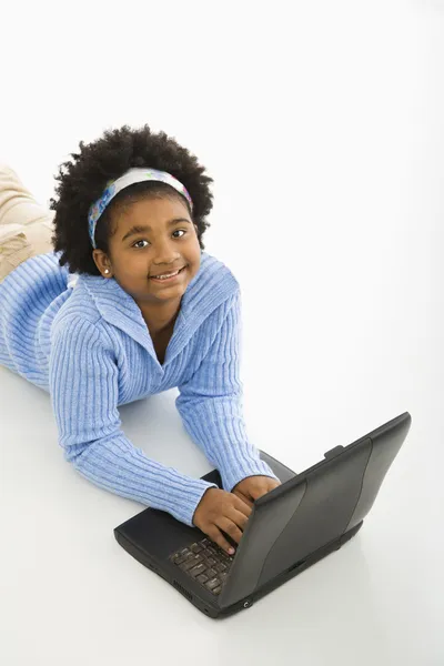 Menina no laptop . Imagem De Stock