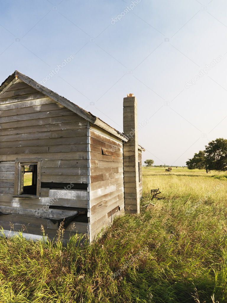 Old house in field.