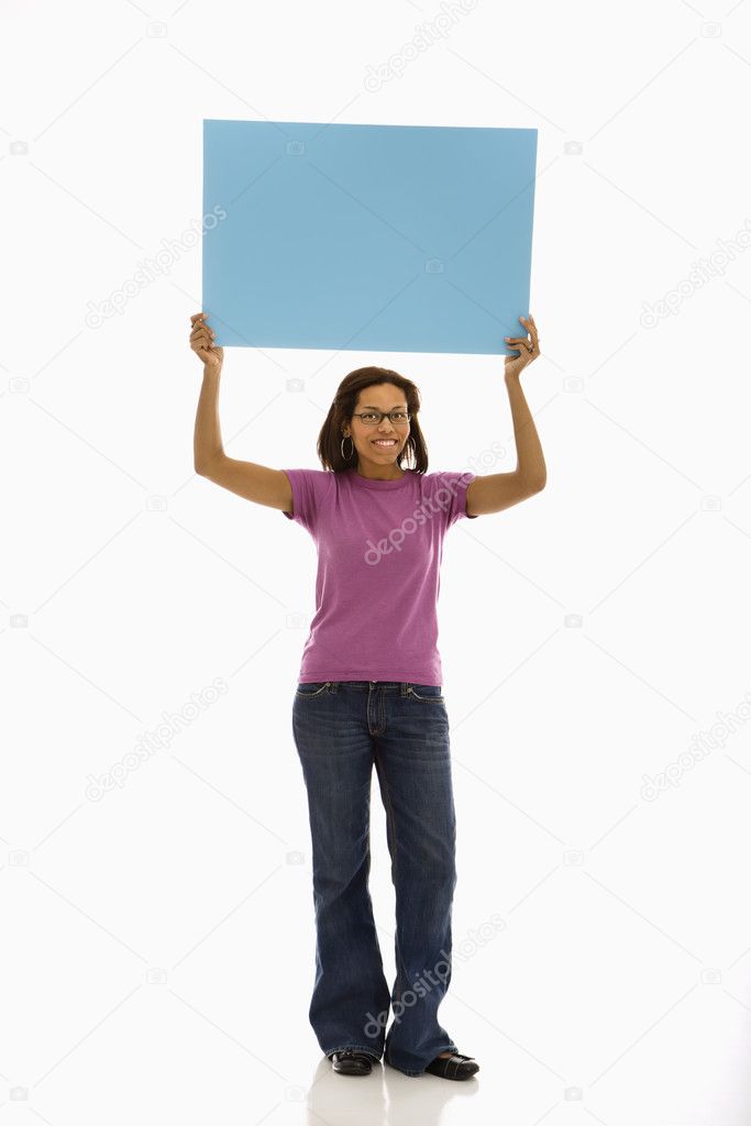 Woman holding sign.