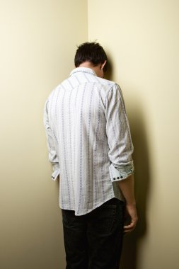 Man standing in corner clipart