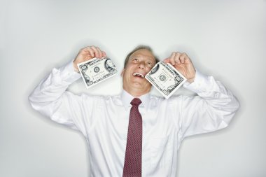 Businessman wasting money clipart