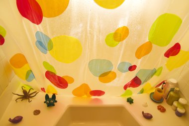 Bathtub and shower curtain. clipart