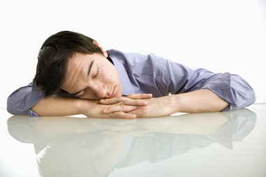 Man sleeping at work. clipart