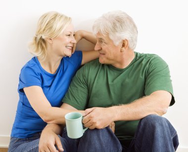 Man and woman relaxing together. clipart