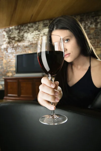Woman toasting wine glass