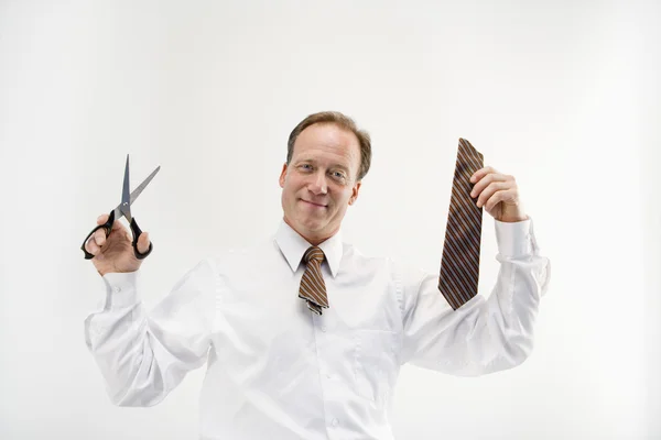 Biznesmen z cięcia krawat — Zdjęcie stockowe