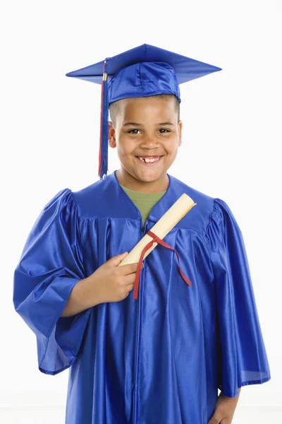 stock image Young hispanic boy graduating.