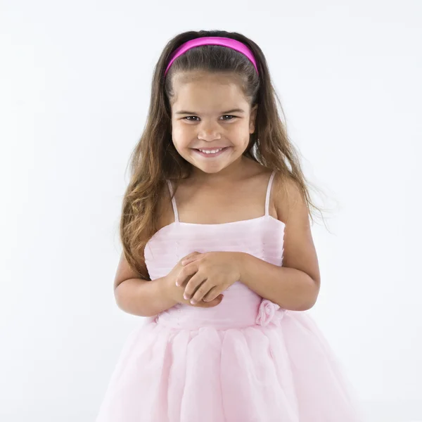 Kicsi lány, pink ruha visel. — Stock Fotó