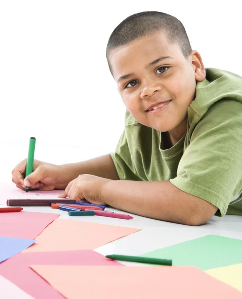Hispanic boy coloring. — Stock Photo, Image