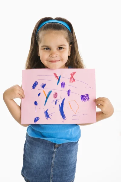 Sorrindo hispânico menina segurando desenho . — Fotografia de Stock