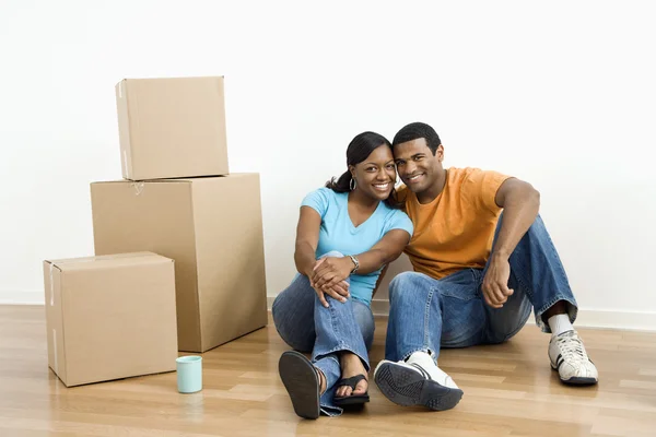 Portrait of couple with boxes. — Stock Photo, Image